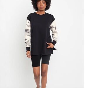 Preloved Toronto black sweater with toile sleeves size XS